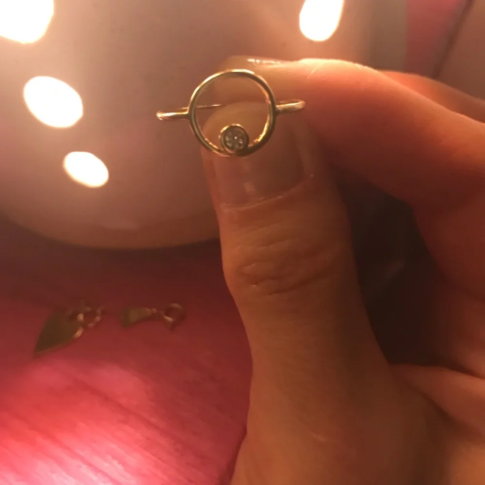 Elegant Gold Ring with Diamond Accent